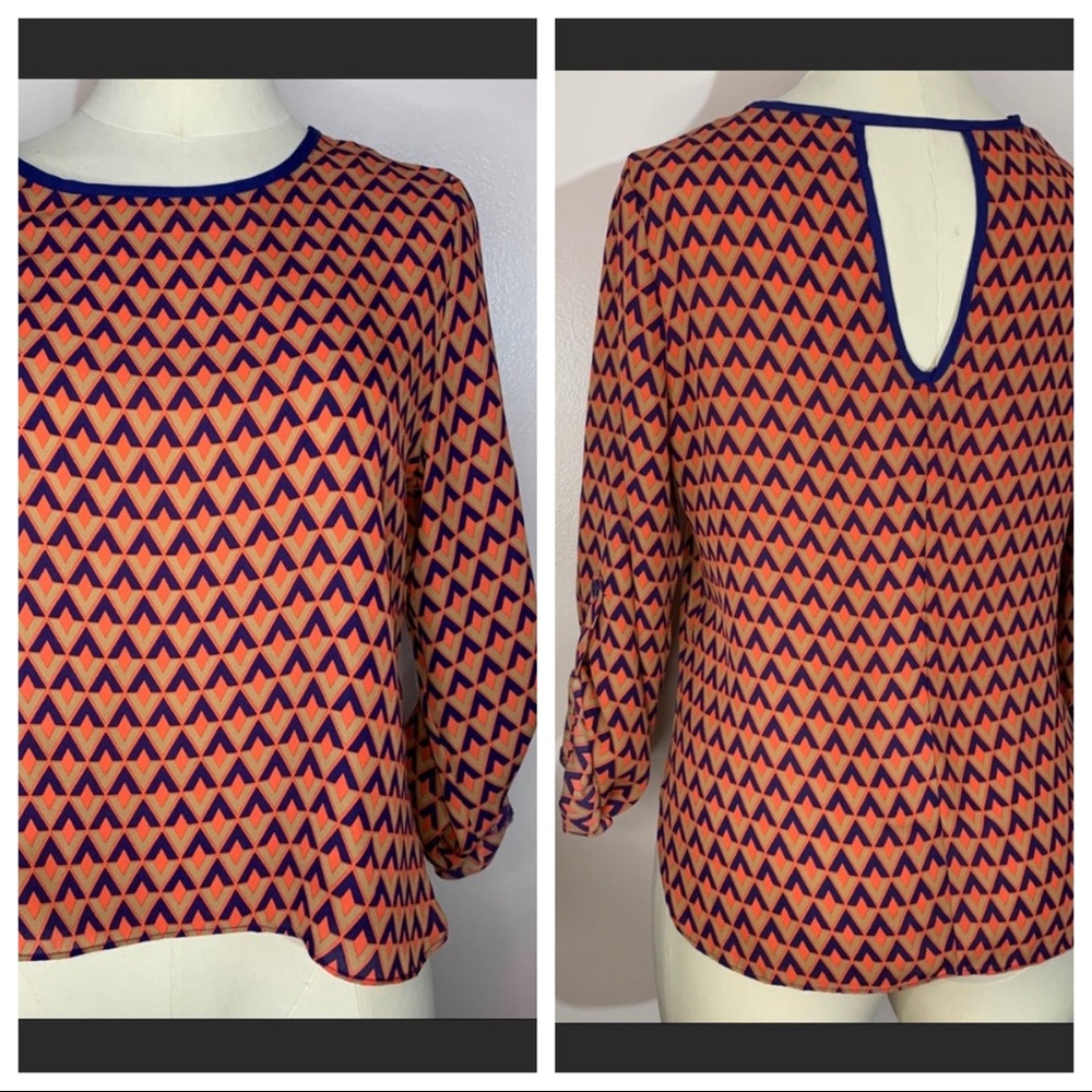 Peep-hole back geometric top